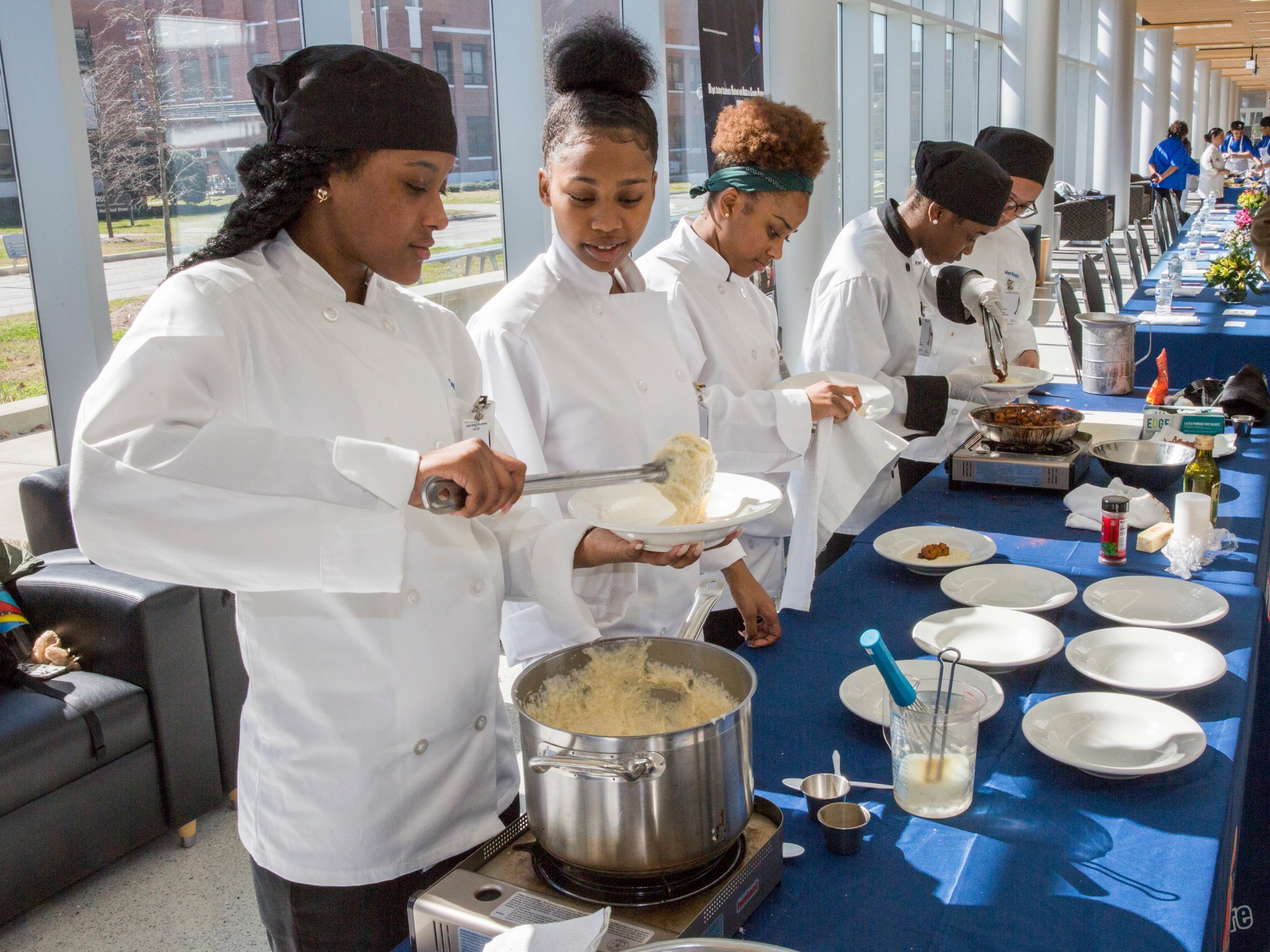 Students from Phoebus High School prepare their breakfast dish at HUNCH's Preliminary Culinary Challenge.
