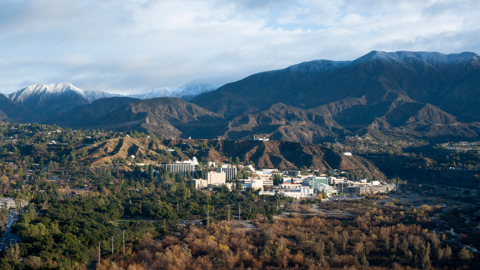 Photo of NASA's Jet Propulsion Laboratory nestled in the Pasadena, CA. hillside.