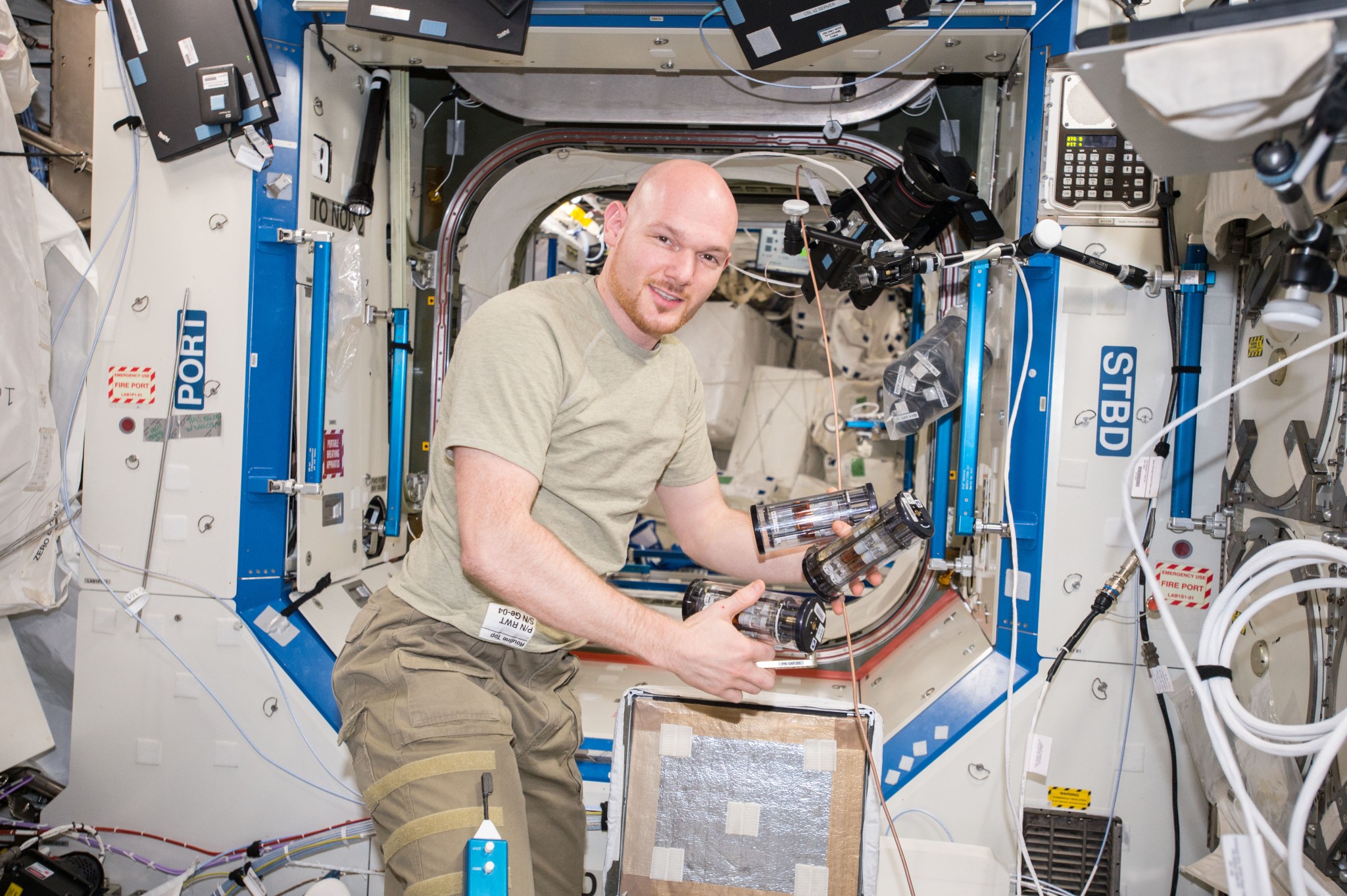 Alexander Gerst of the European Space Agency (ESA) works with the Micro 8 experiment in the U.S. National Laboratory during Expe