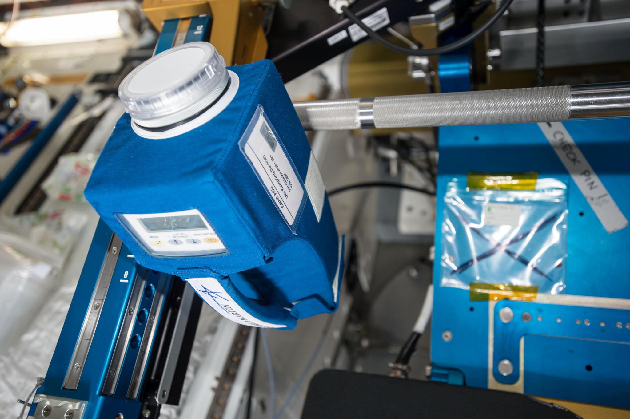 MT-2 hardware positioned in the Node 2 module of the International Space Station to collect a sample of the microbes and viruses