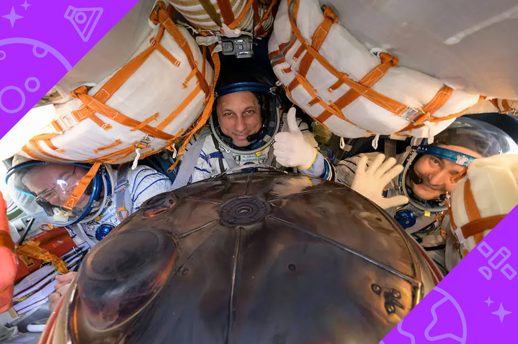 The Expedition 66 crew is pictured inside the Soyuz MS-19 spacecraft