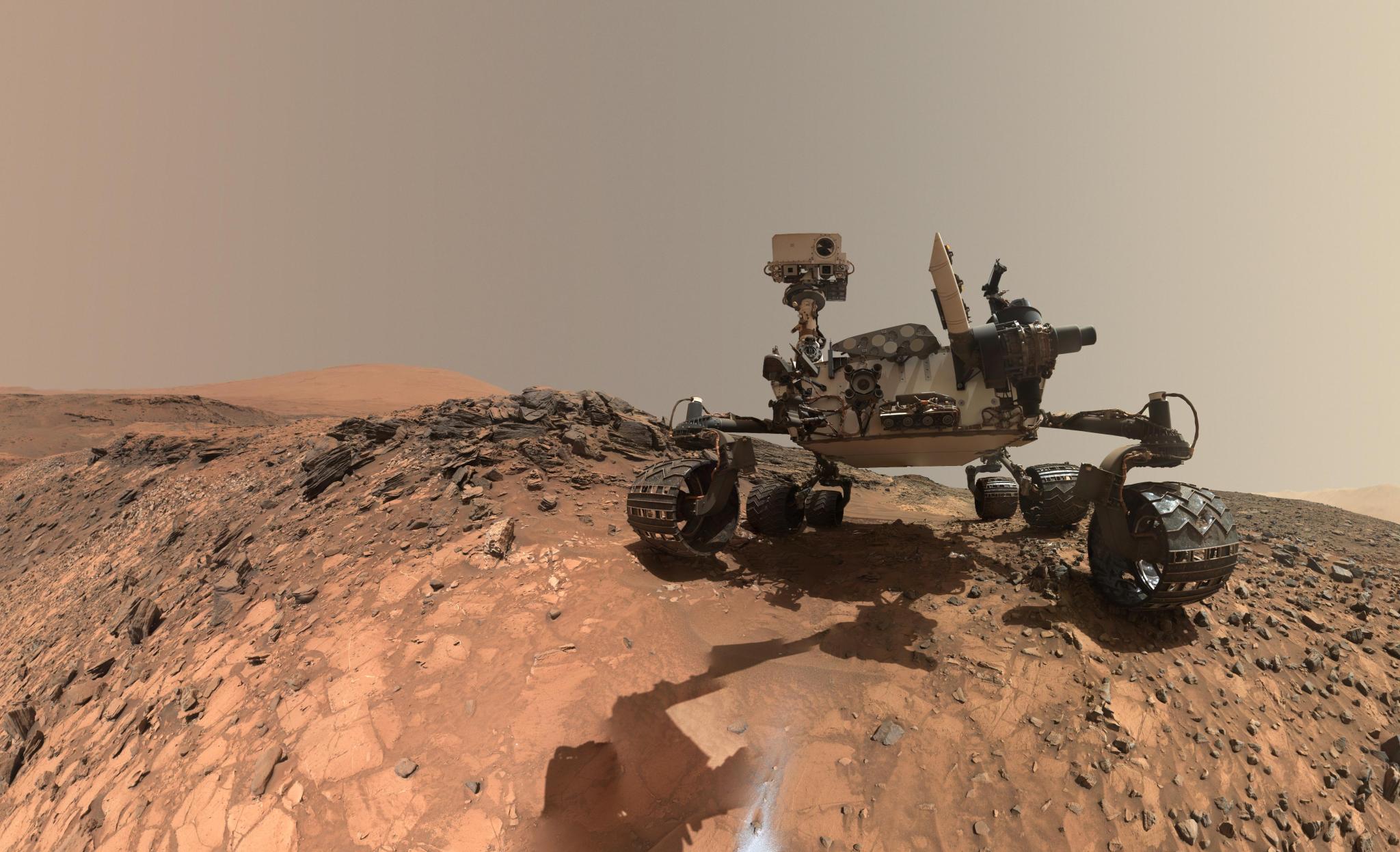 This low-angle self-portrait of NASA's Curiosity Mars rover shows the vehicle at the site from which it reached down to drill in