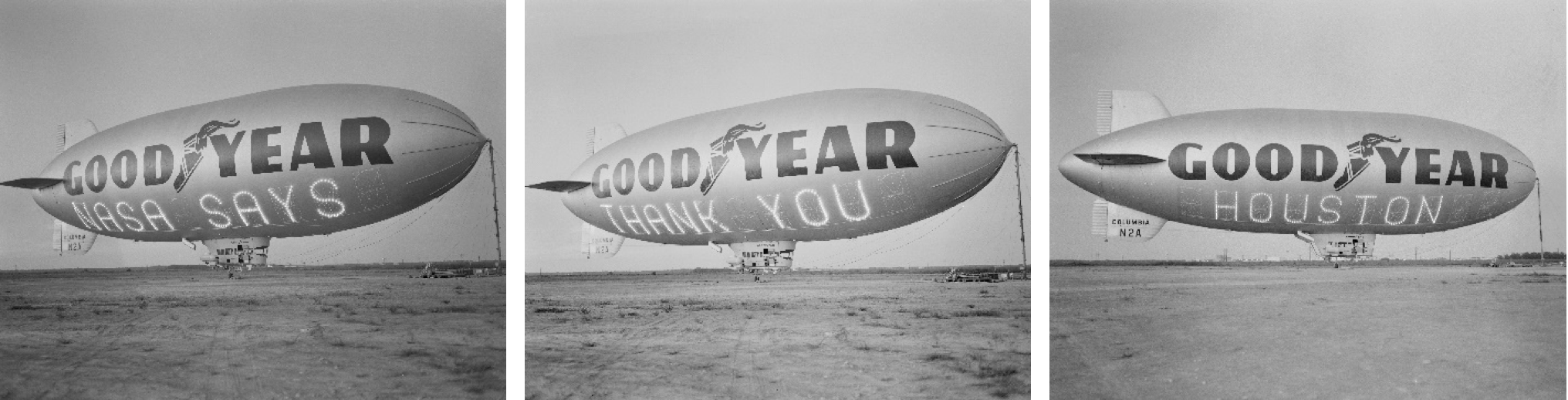 Good Year Blimp parked on the ground with the words NASA SAYS, THANK YOU, and HOUSTON shown on its side.