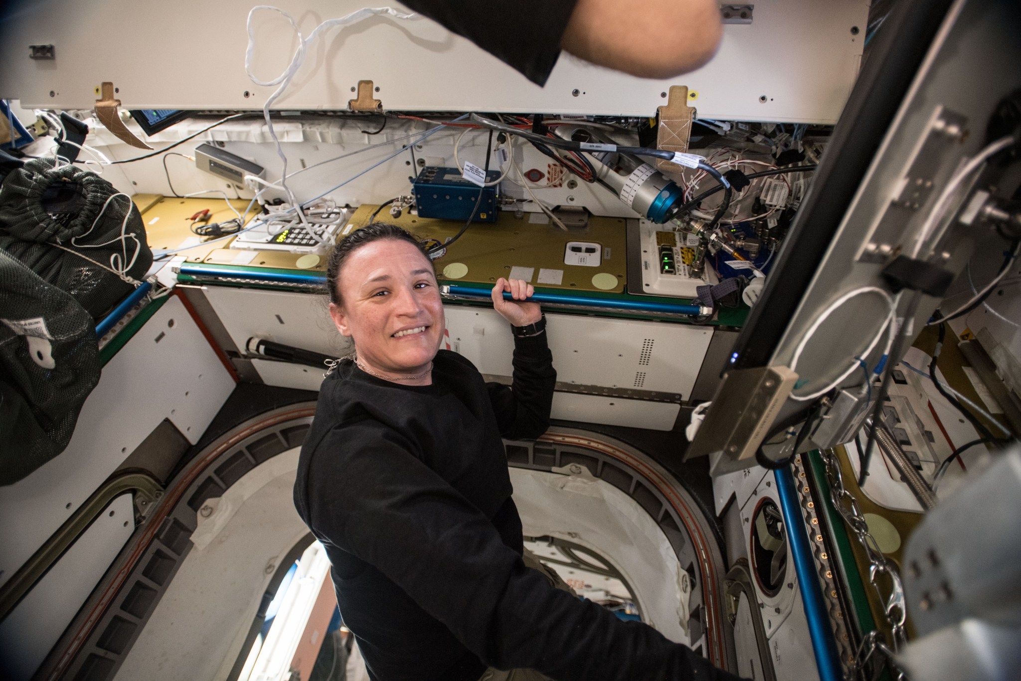 NASA astronaut Serena Auñón-Chancellor is pictured here during an Hydrogen Sensor Oxygen Generation System Remove and Replace.