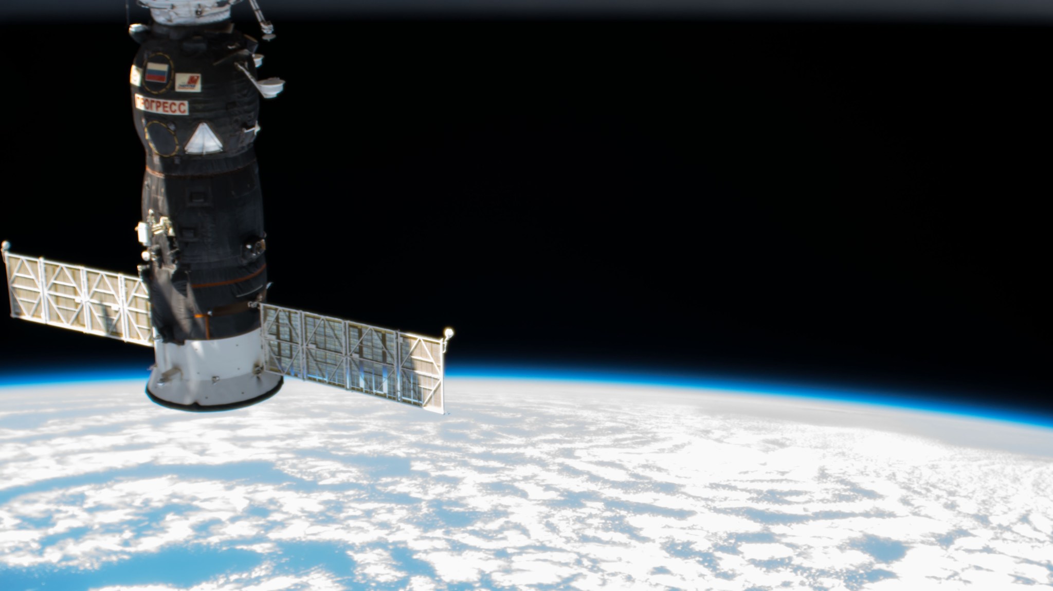 A previous Russian Progress resupply ship is pictured docked to the Pirs docking compartment on the International Space Station 