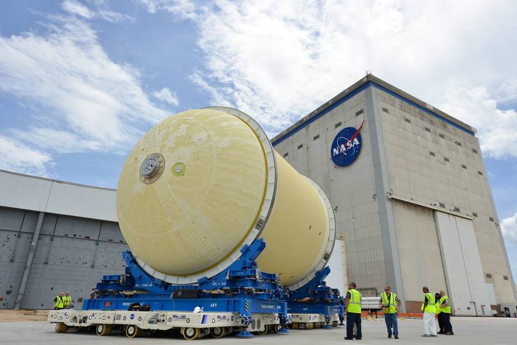 A large Space Launch System part rolls out of Michoud Assembly Facility.