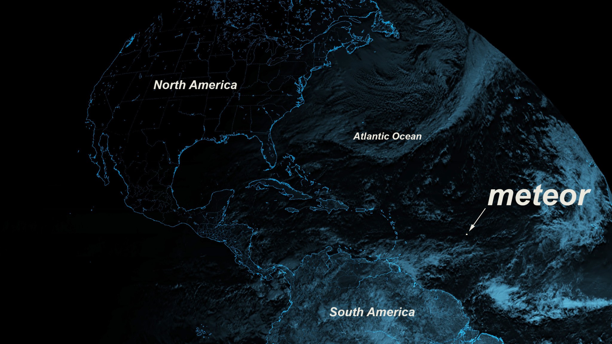 A meteor appears in a satellite image of Earth as a white spot over the ocean.