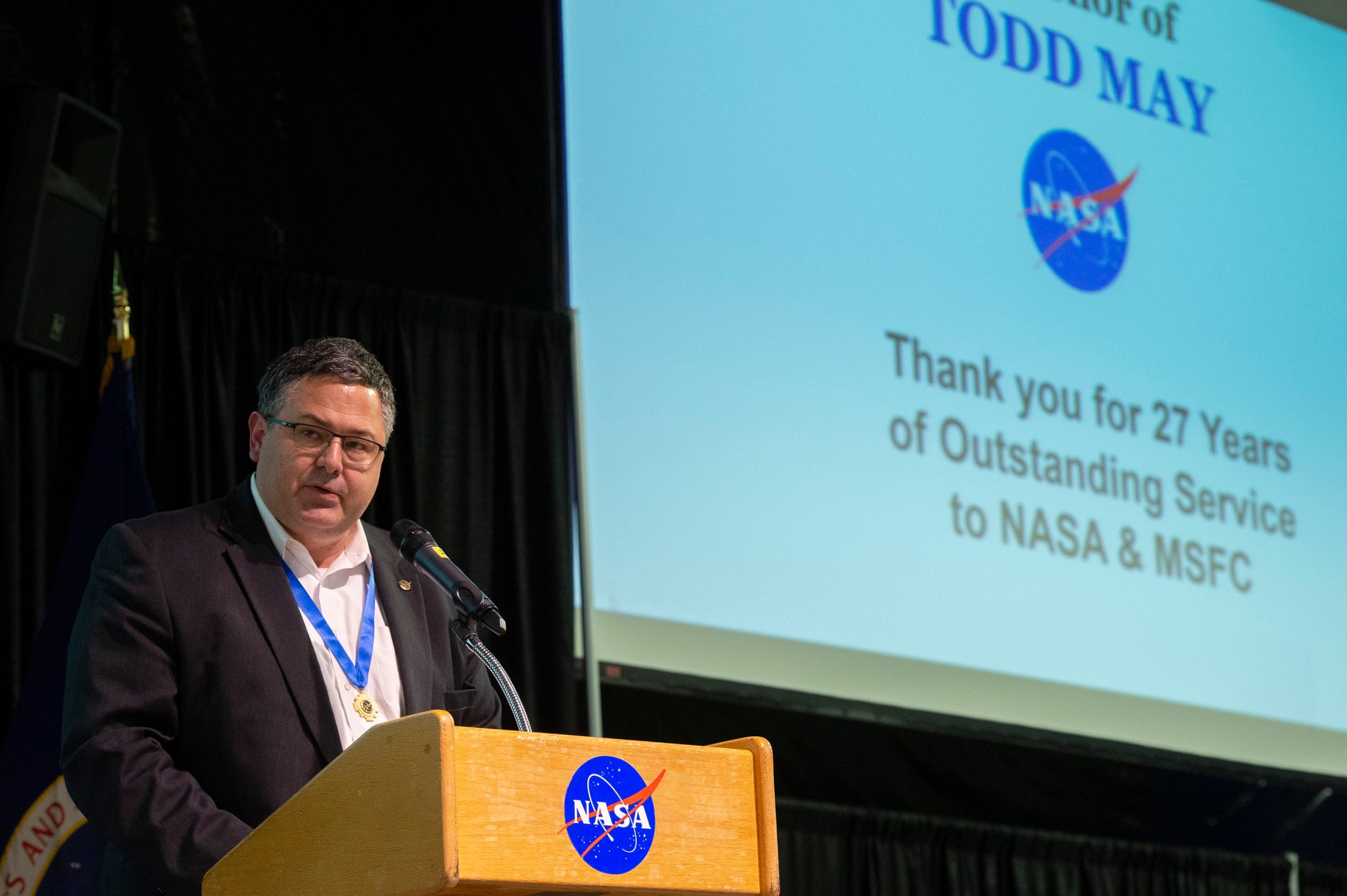 Todd May thanks the Marshall team during his farewell address at the reception July 25 honoring his service as he retires.
