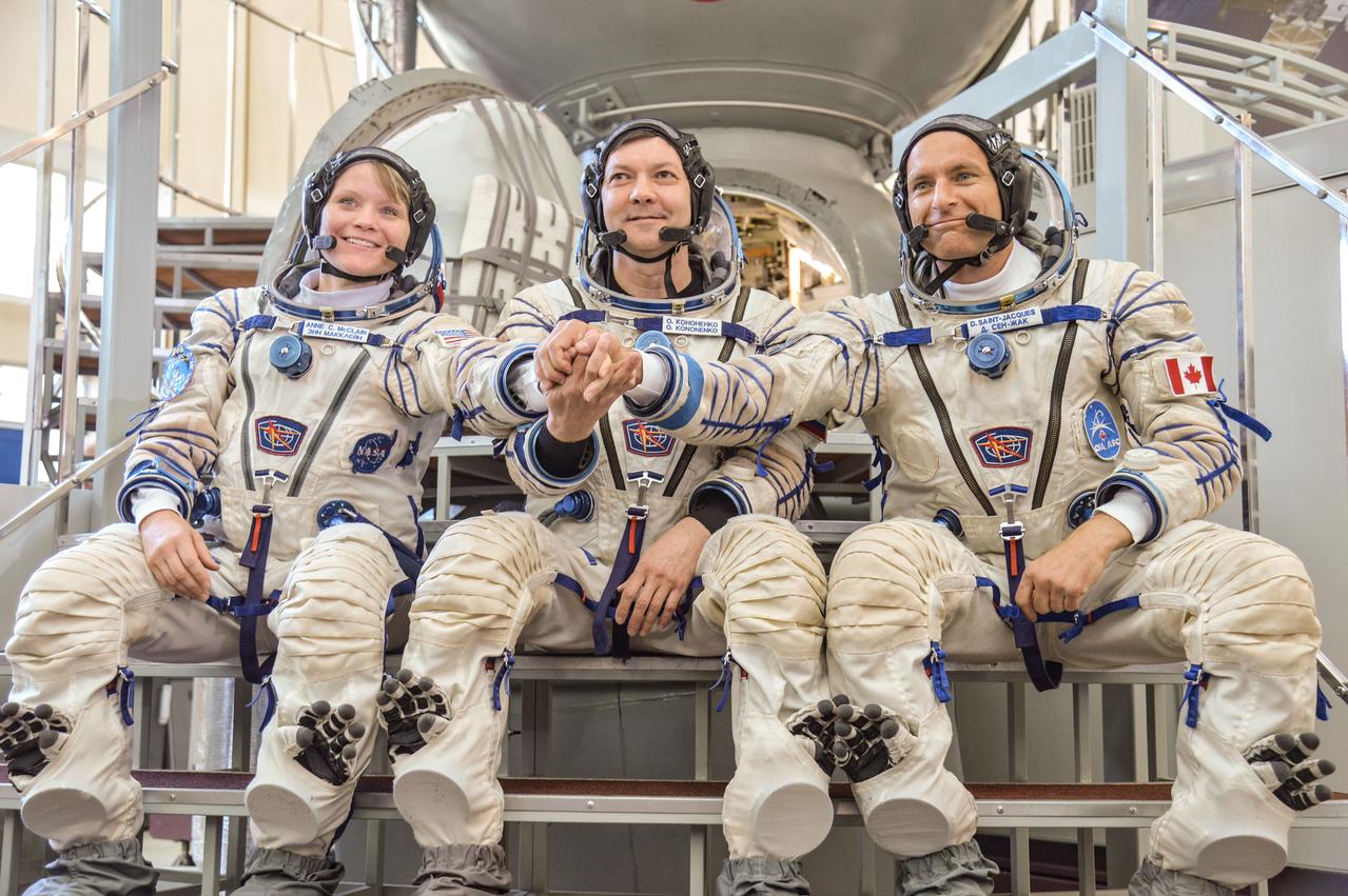 Expedition 58 crew members Anne McClain, Oleg Kononenko and David Saint-Jacques