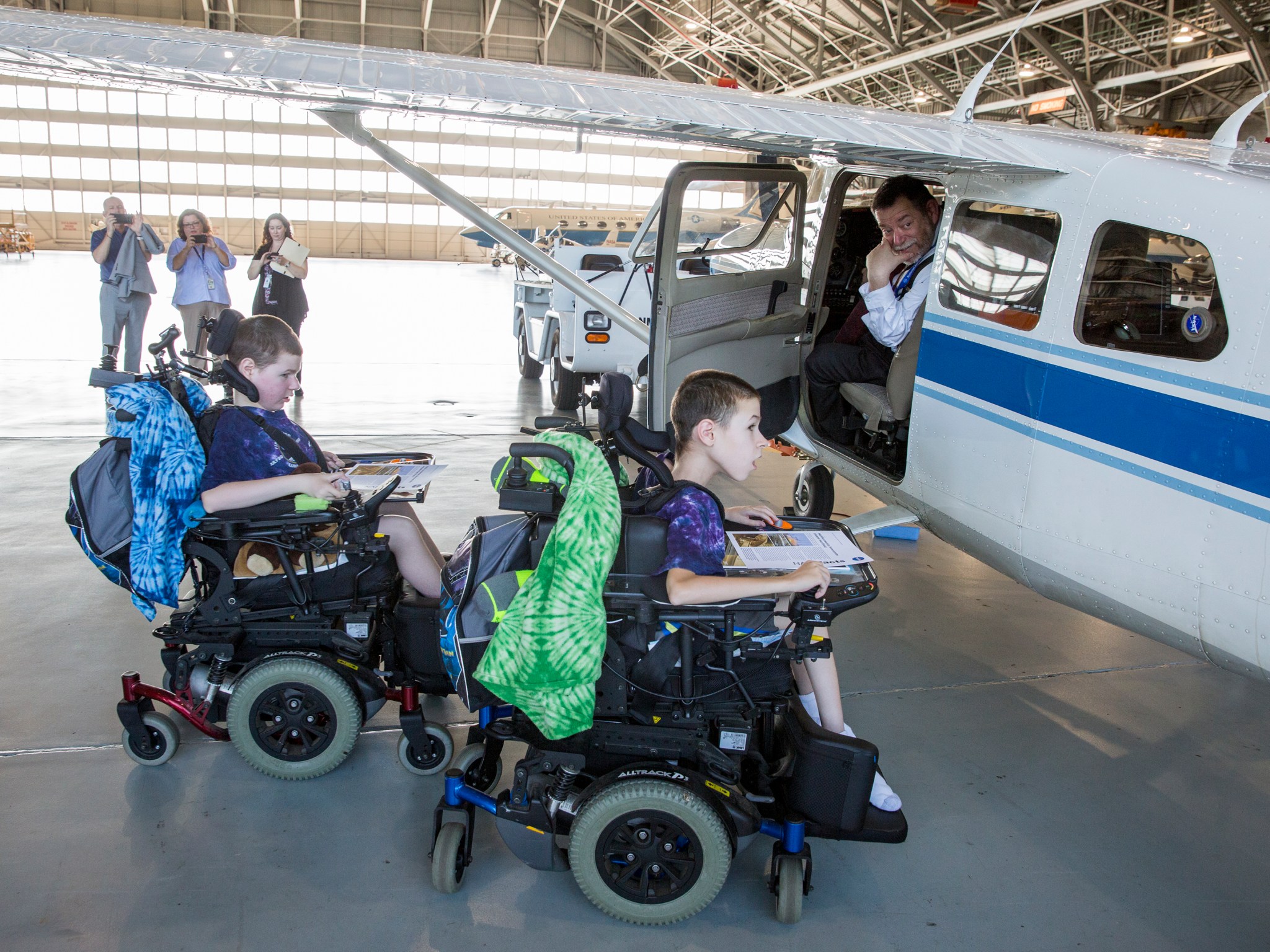 Evan Horowitz shows Mikey and Robbie one of Langley's research aircraft