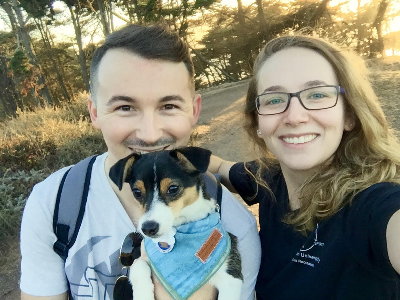 Courtney Batterson with Alex, and Mabel, their dog at Baker Beach in SF. 