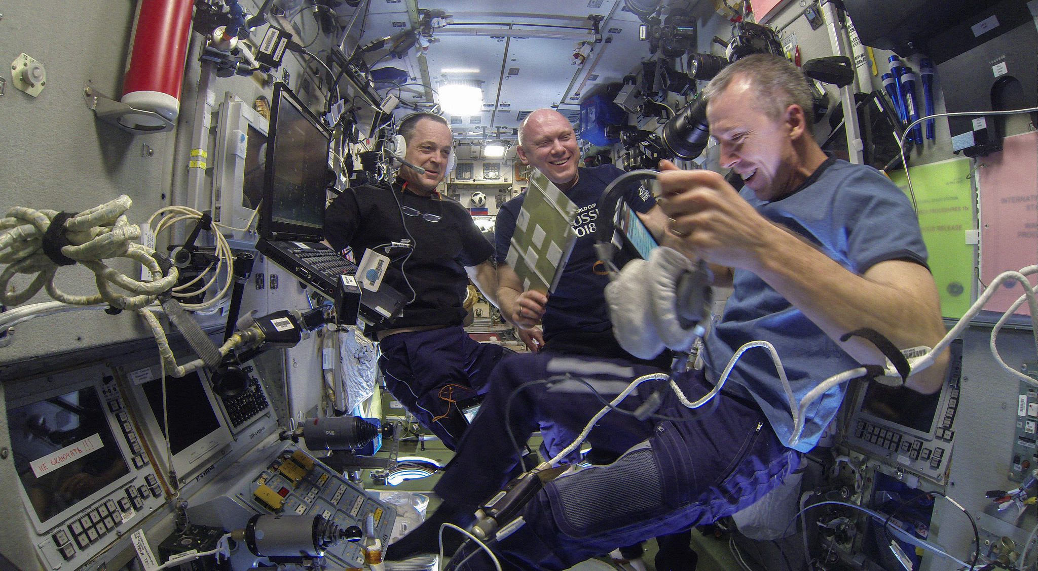 Drew Festal (right) and Ricky Arnold (left) of NASA, along with Oleg Artemyev of Roscosmos (center)