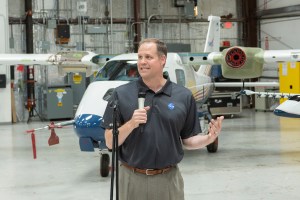 NASA Administrator Bridenstine talks to press in front of the X-57.