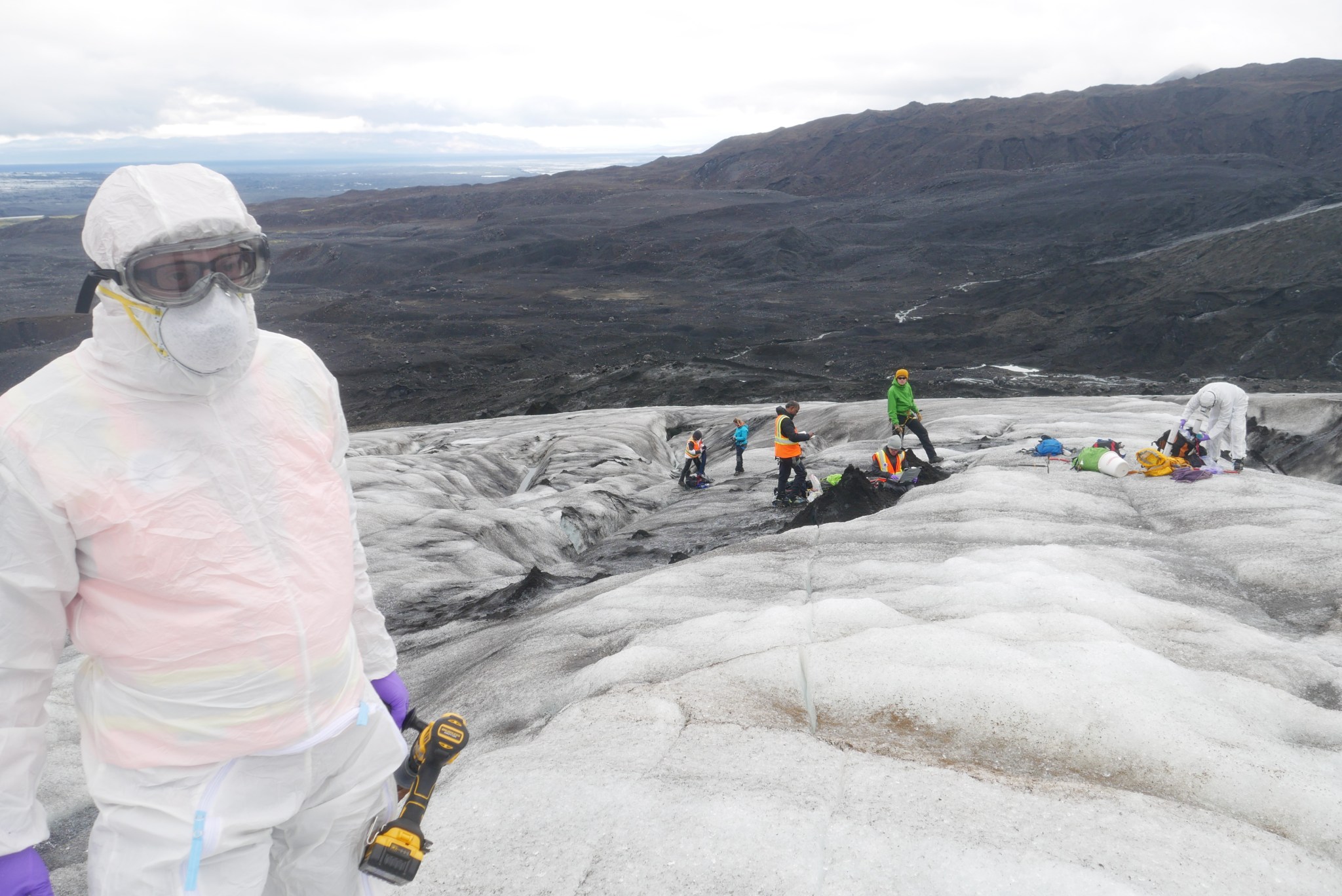 workers on a glacier