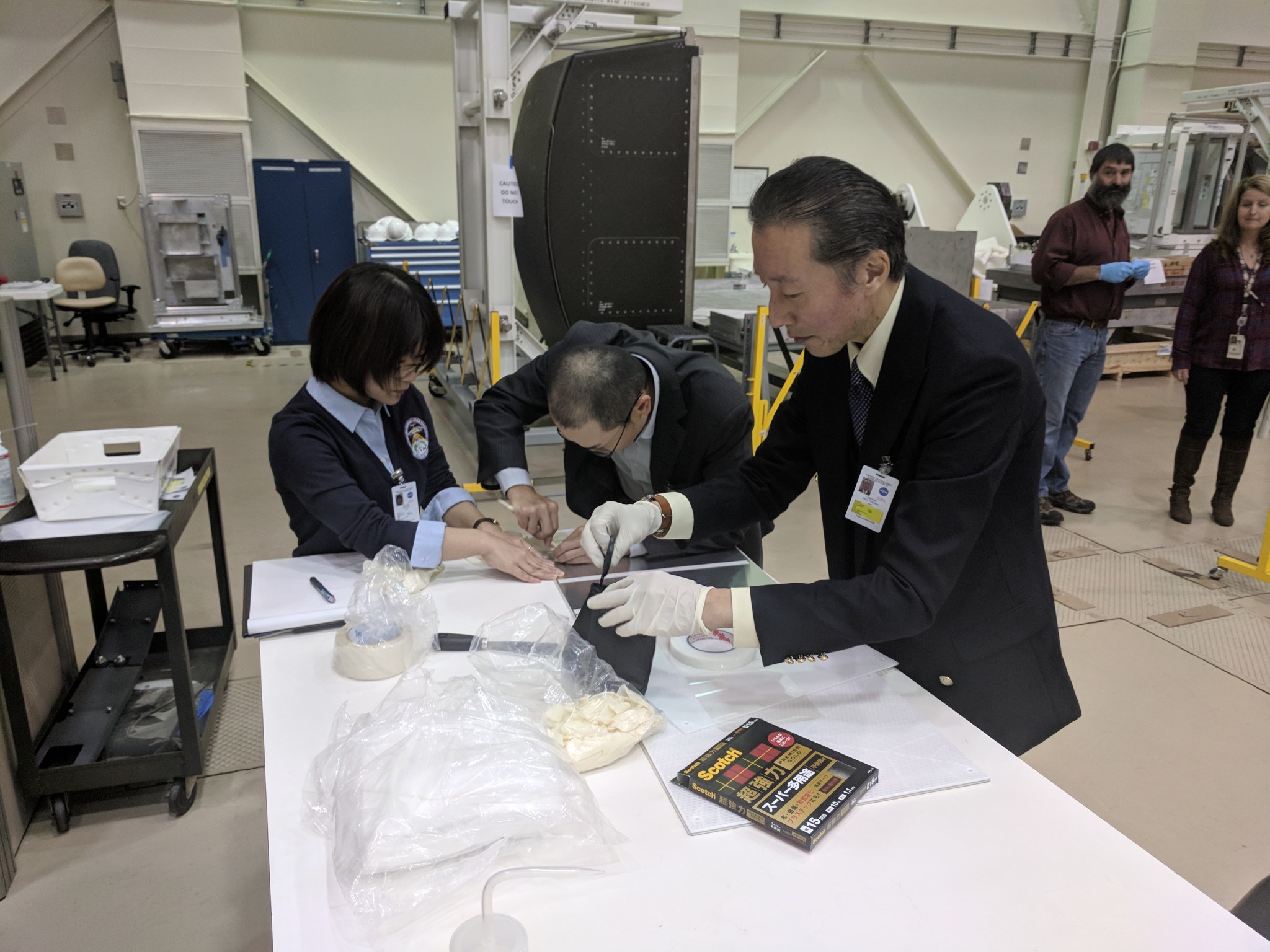 From left, Japanese aerospace engineers Maki Abe, Kosuke Kudo and Yoshiaki Okui, engineer Patrick Fulda and Dona Smith.
