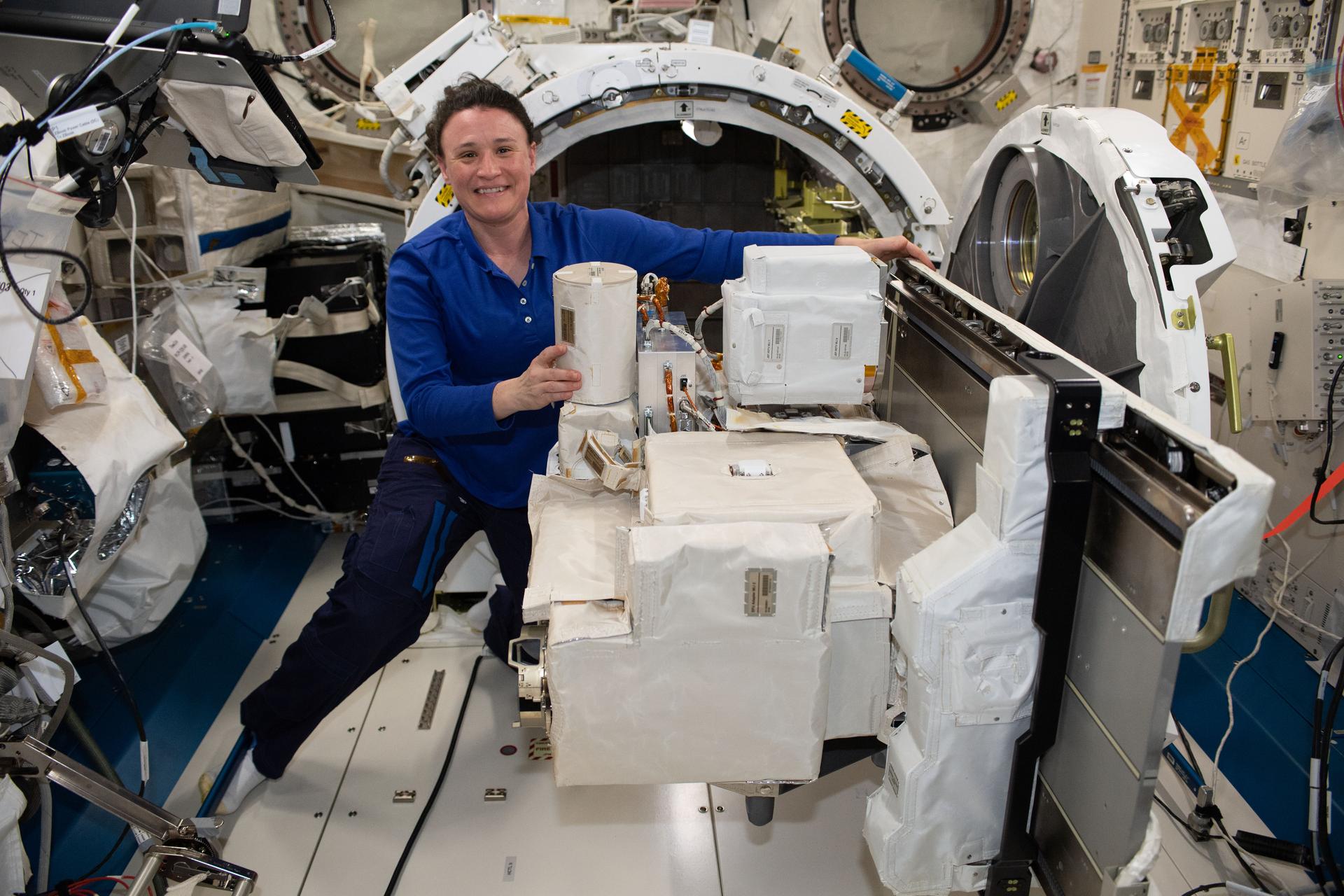 NASA astronaut Serena Auñón-Chancellor replaces a high-definition television camera inside Japan’s Kibo laboratory module.
