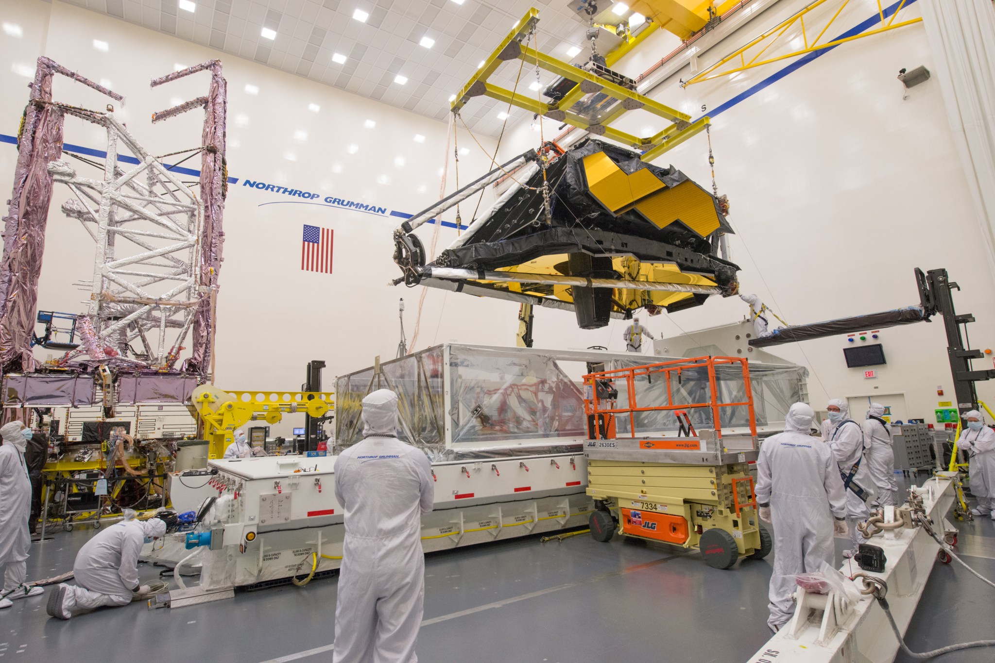 With all flight components under one roof, technicians and engineers work to prepare the two halves of the JWST.