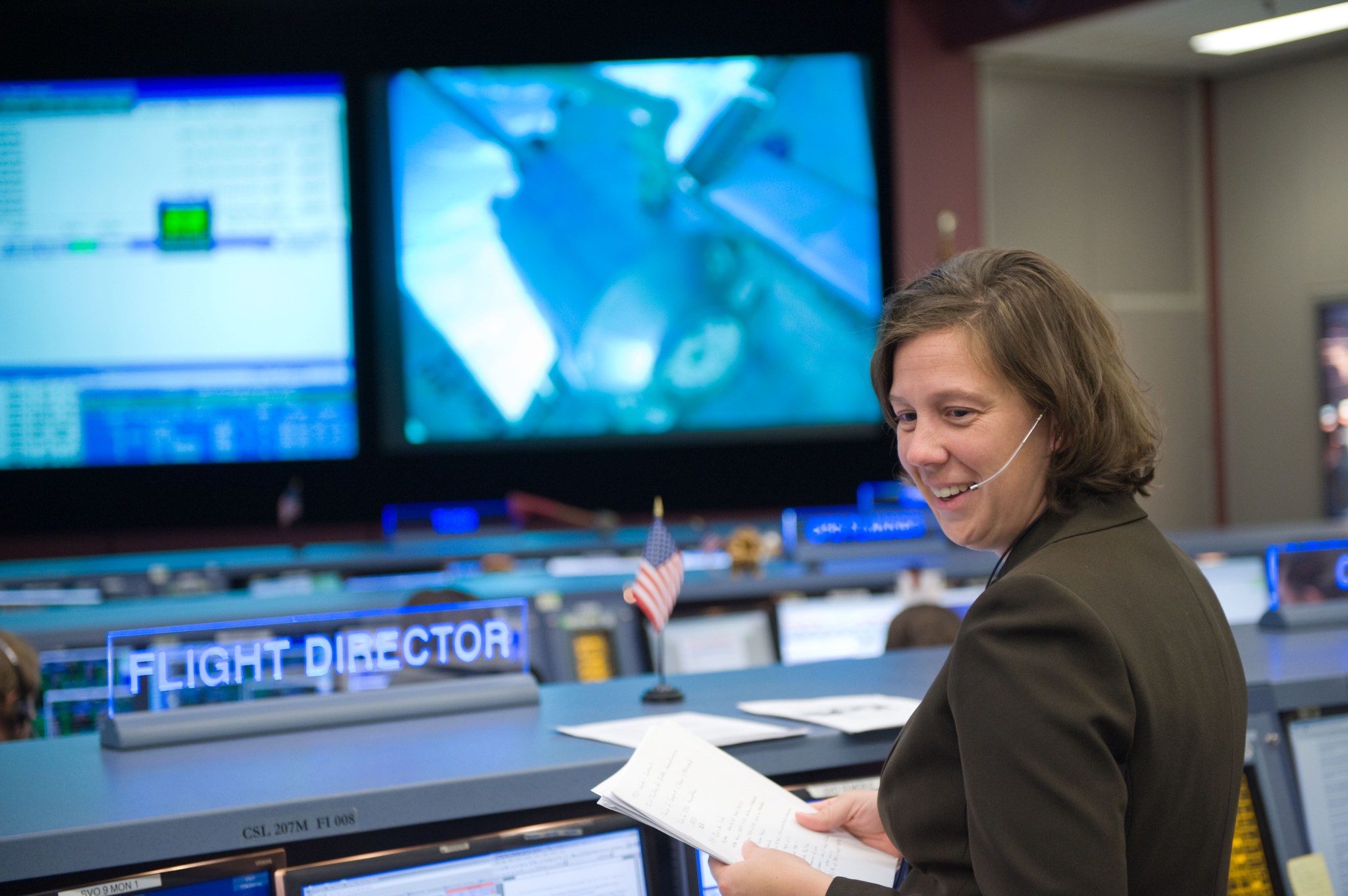 Holly Ridings at her Flight Director console in the space station flight control room in the Mission Control Center 