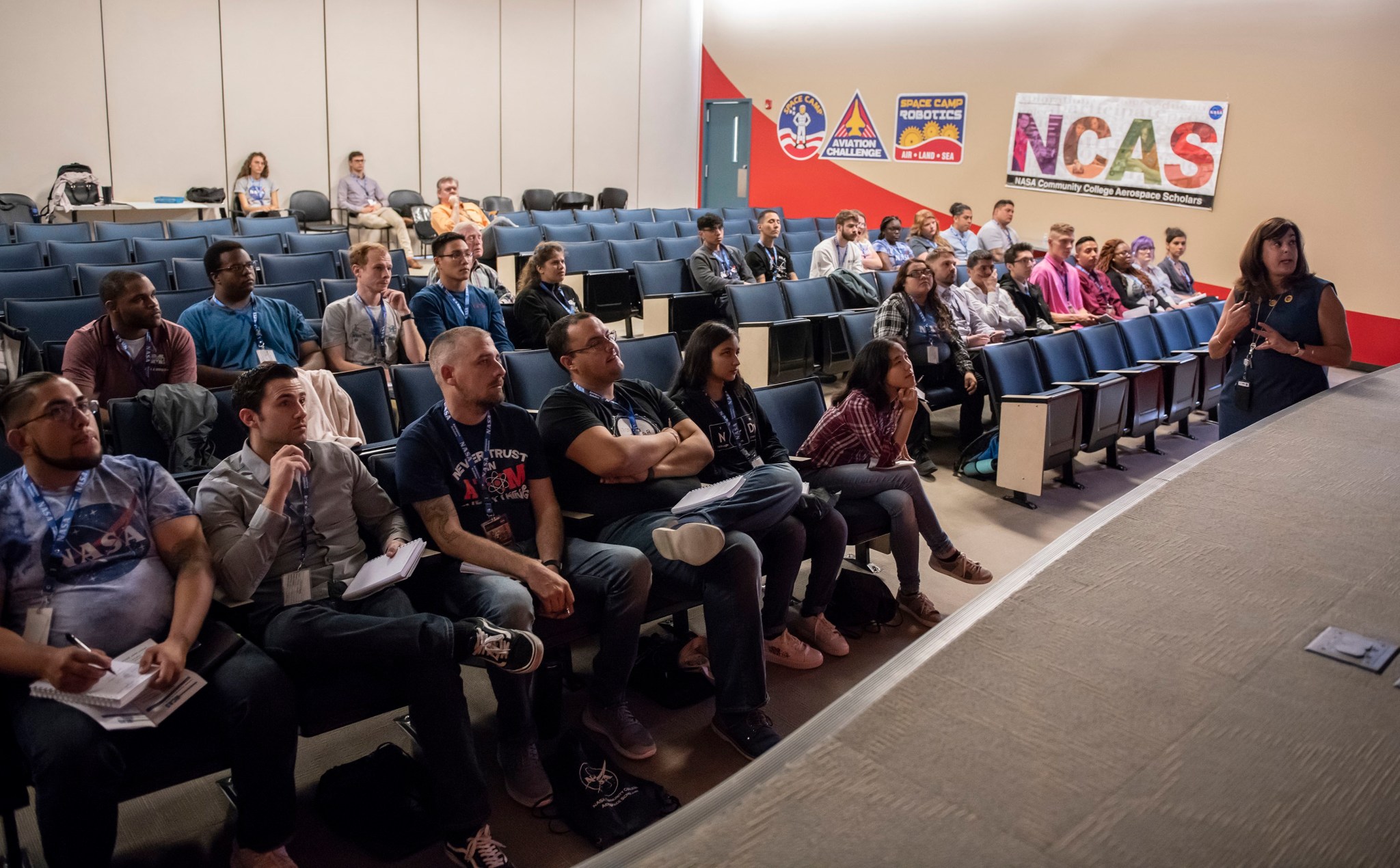 NASA microbiologist Monsi Roman, far right, addresses three-dozen community college students from around the nation.