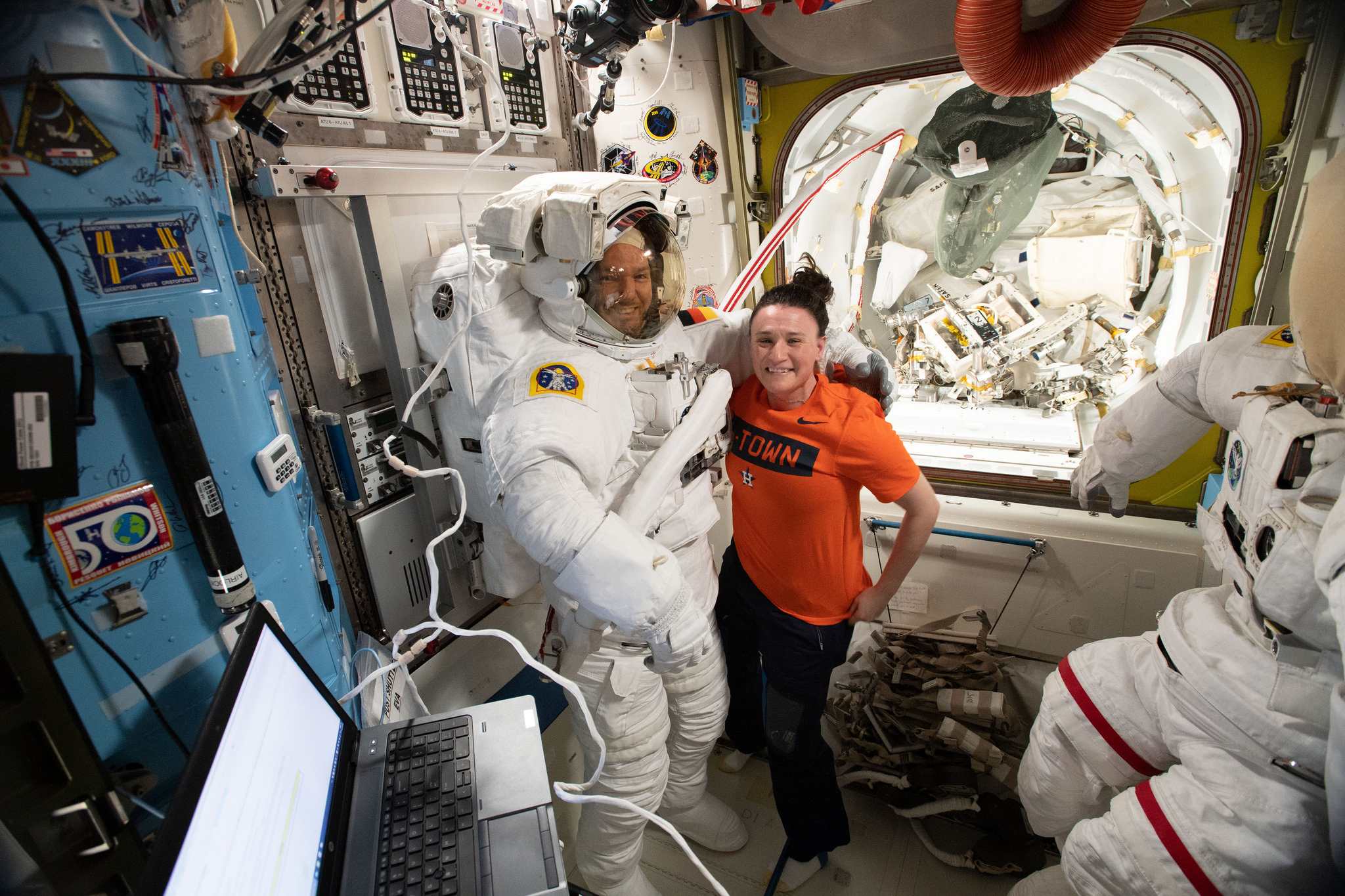 NASA astronaut Serena Auñón-Chancellor assists ESA (European Space Agency) astronaut Alexander Gerst
