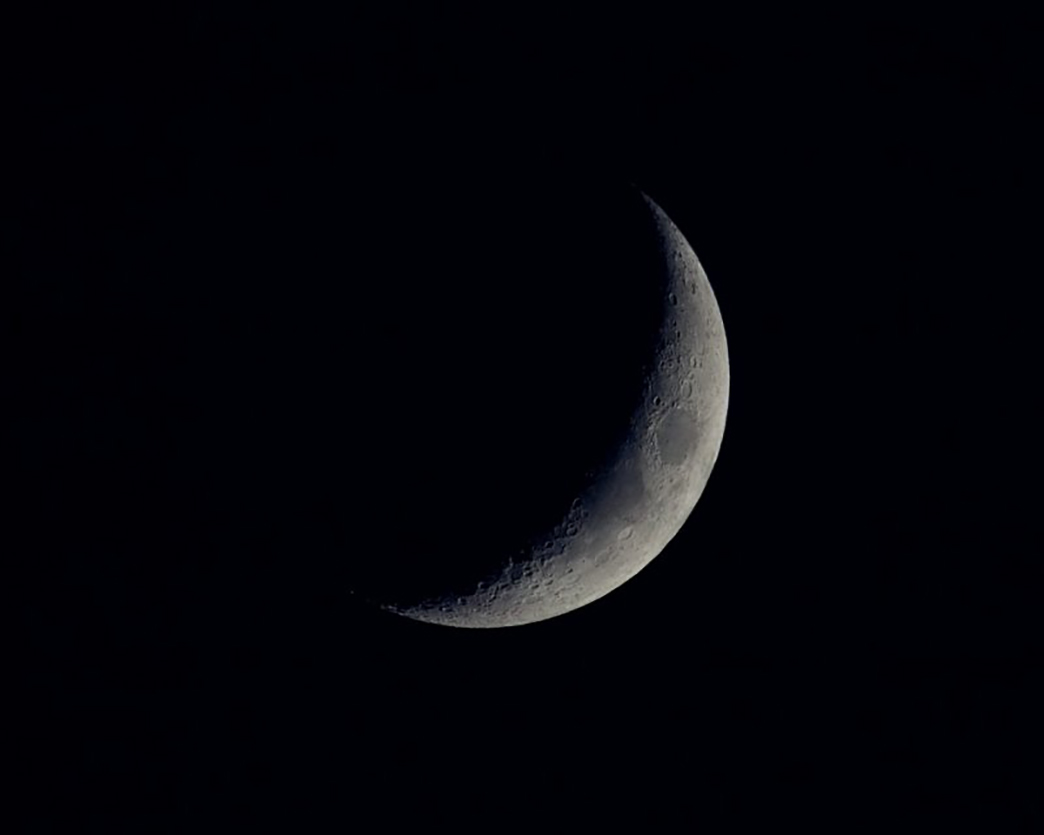 Moon rises over Huntsville, Alabama