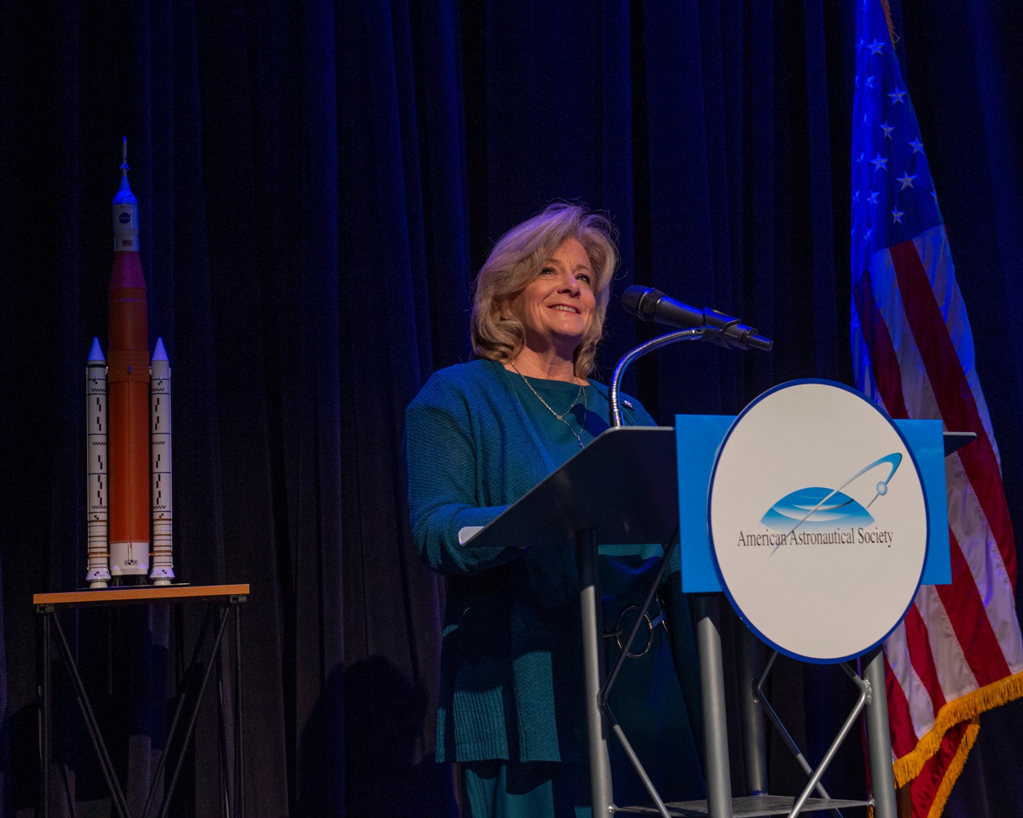 Marshall Center Director Jody Singer welcomes the audience Oct. 24 to begin the 11th annual Wernher von Braun Memorial Symposium