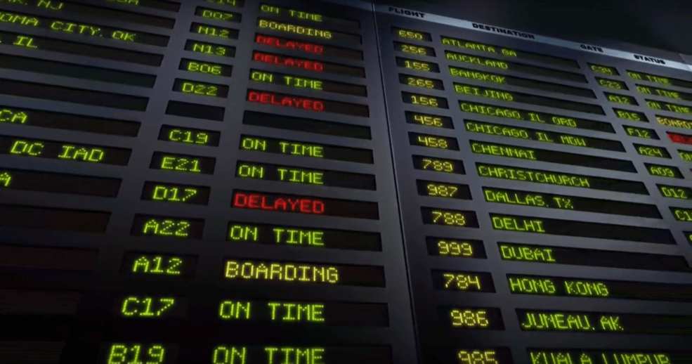 A board showing the status of multiple flights arriving at an airport
