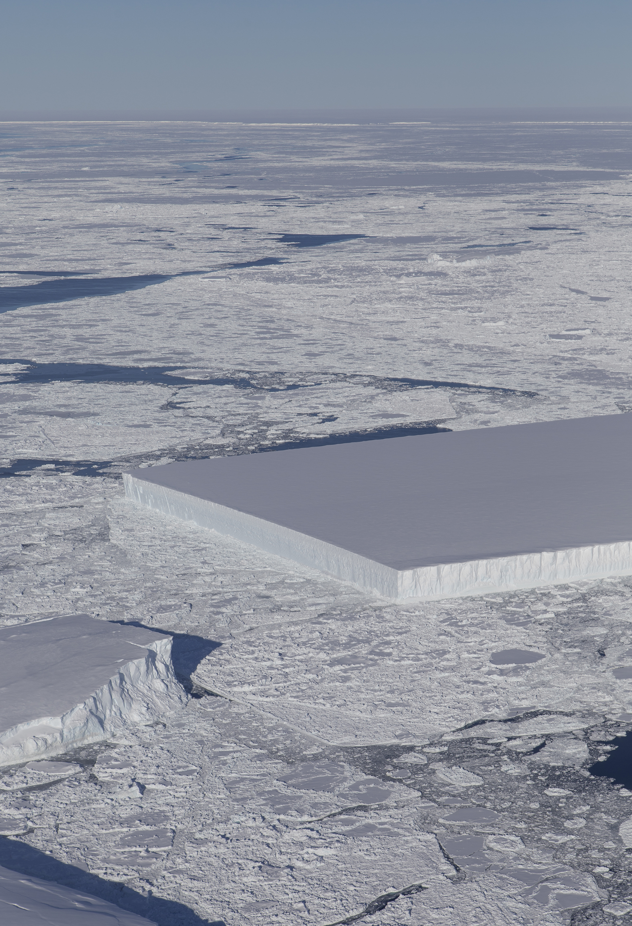 rectangular iceberg photographed from an IceBridge flight on 16 Oct 2018