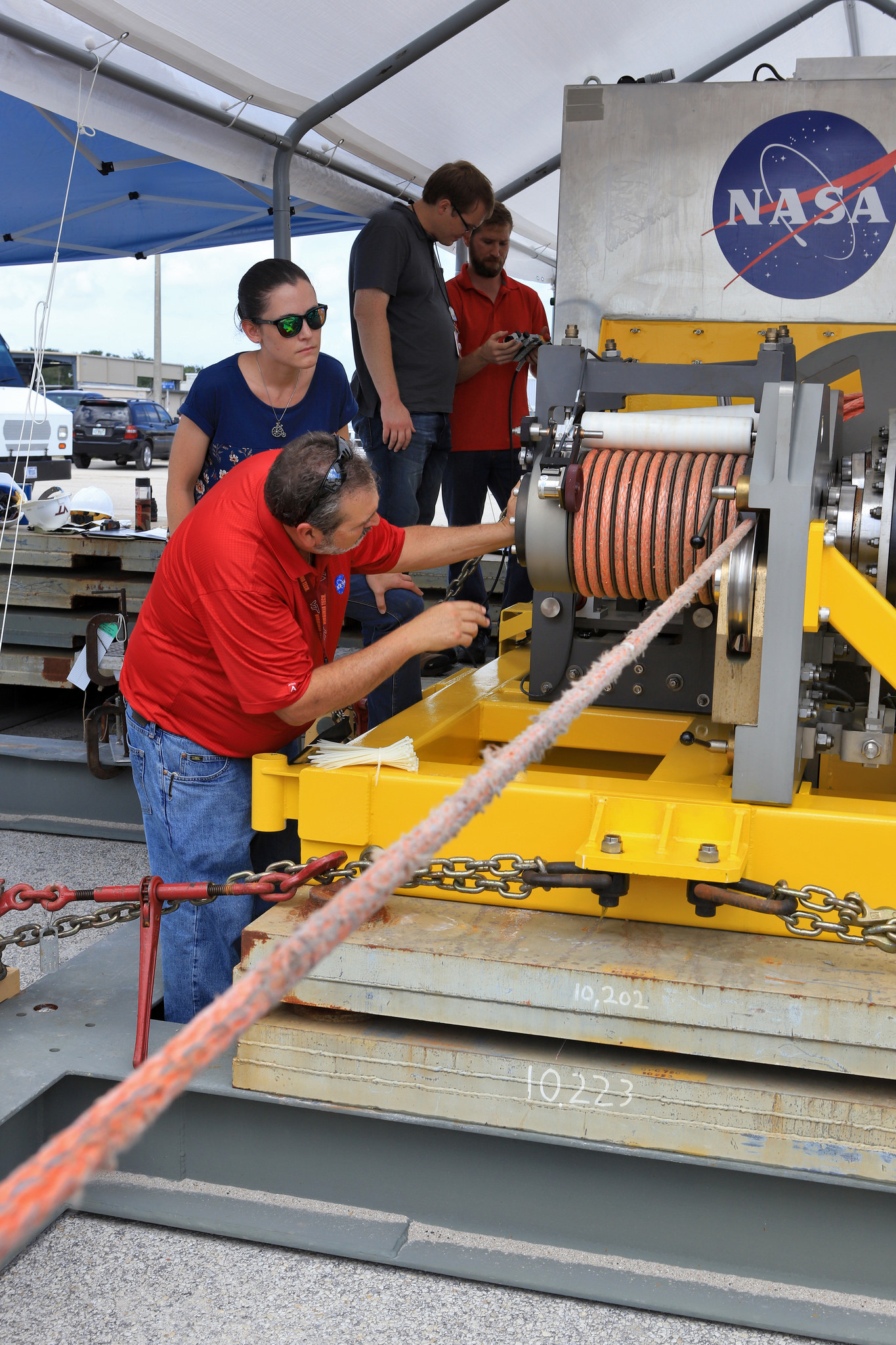 Orion Landing and Recovery team members practice using a winch to prepare for Underway Recovery Test 7.