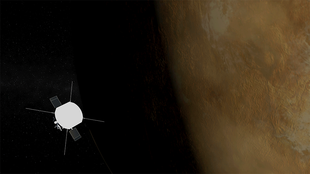 Animation of Parker Solar Probe flying in front of Venus. Parker is an elongated silver spacecraft with a flat white angular sunshield originally pointed toward the camera. Venus looms large in the background, a mottled yellow and beige planet.