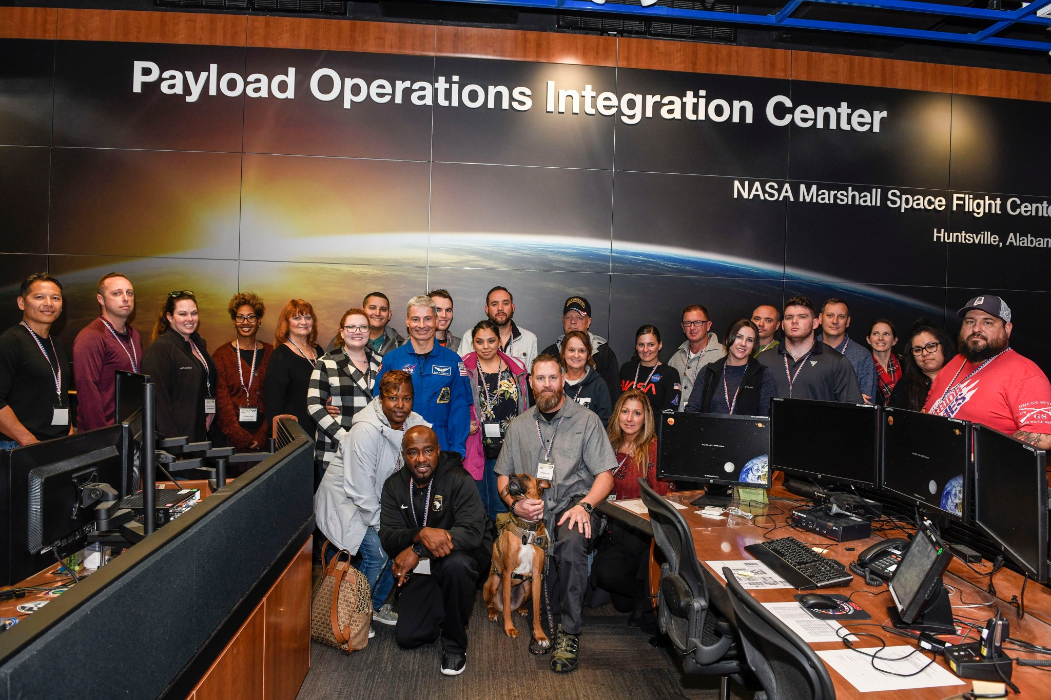 During his Nov. 9 visit to Marshall's Payload Operations Integration Center, Mark Vande Hei stands in the foreground.