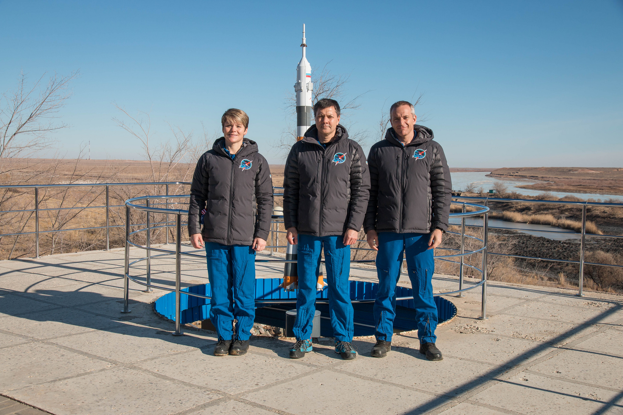 Expedition 58 crew members Anne McClain, left, Oleg Kononenko, center, and David Saint-Jacques Nov. 27 in In Baikonur.