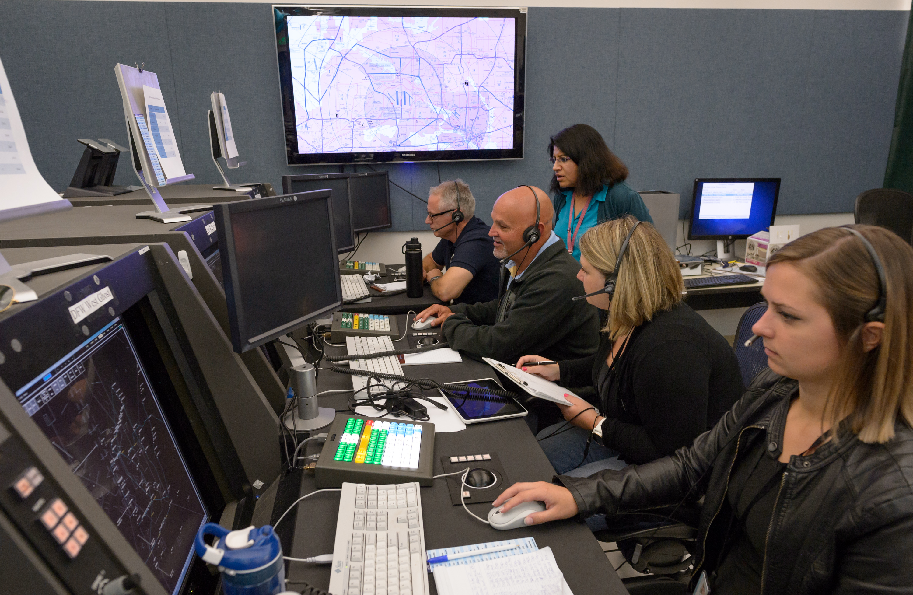 Air traffic controller stations with human-in-the-loop testers