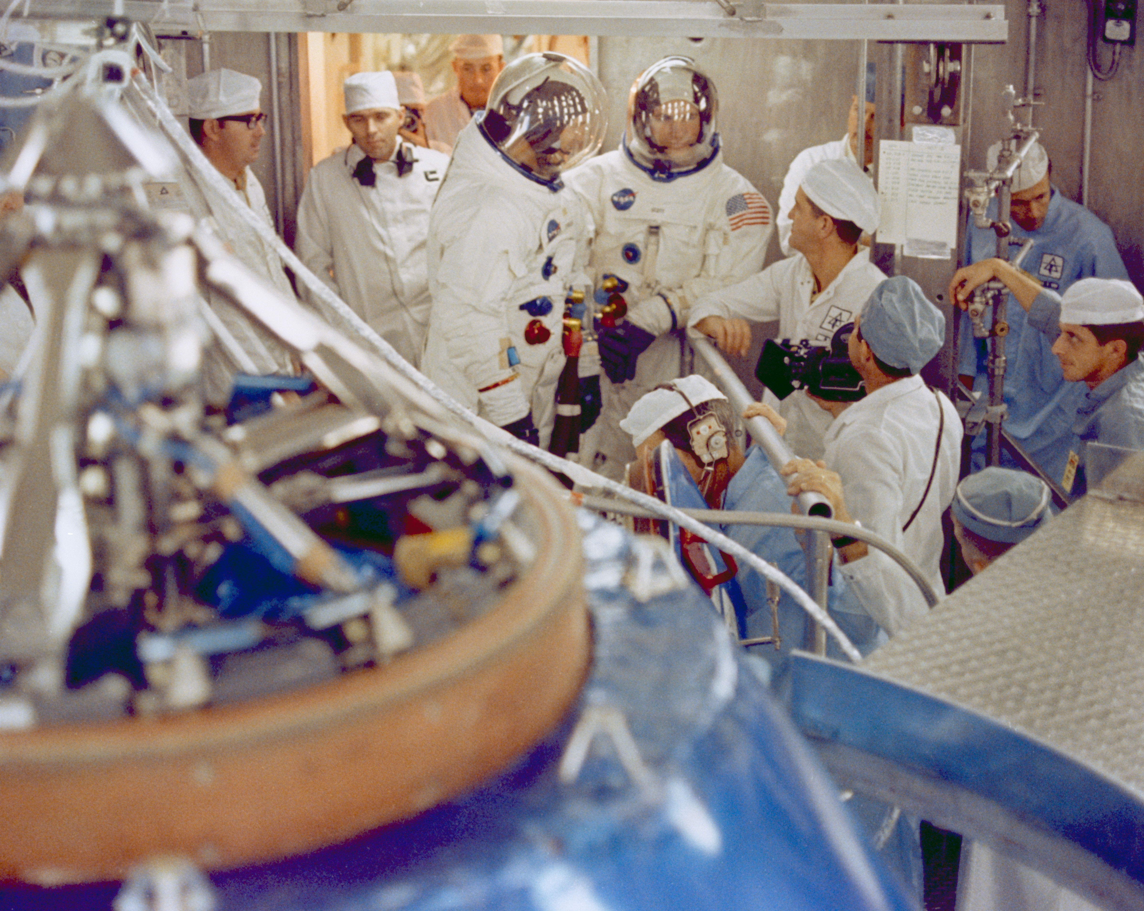 Apollo 9 prime crew McDivitt (left), Scott (right), and Schweickart (not pictured) prepare for an altitude chamber test in the CM