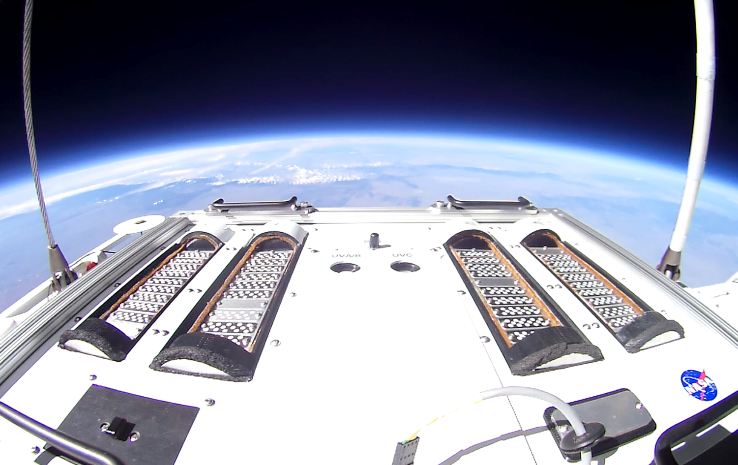 The E-MIST experimental hardware floating 19 miles above the Earth aboard a NASA scientific balloon.