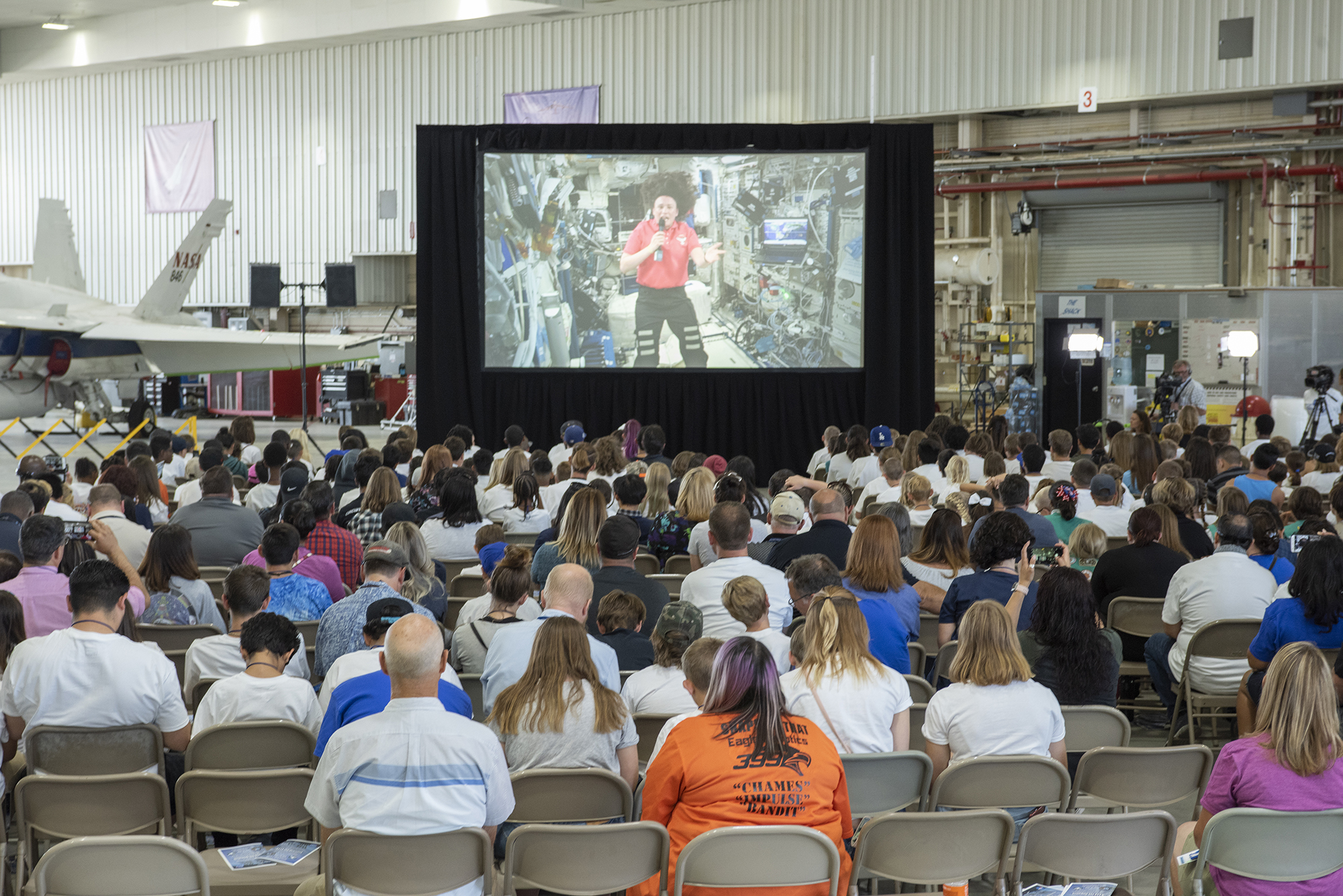 Over 300 students watch as Serena M. Aunon- Chancellor answer questions from the ISS.