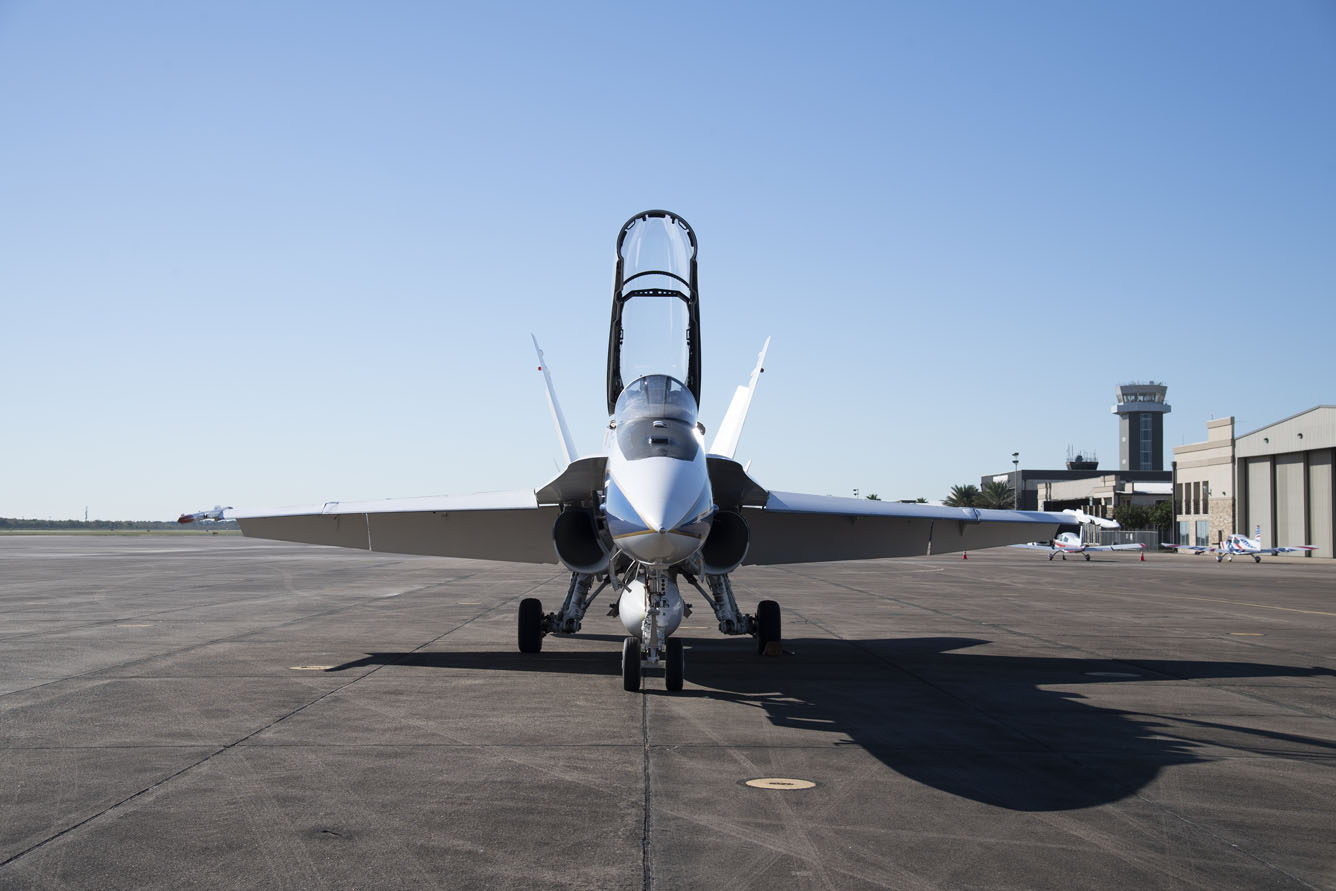 NASA pilots conduct pre-flight safety checks on the aircraft prior to a supersonic research flight for the QSF18 series.