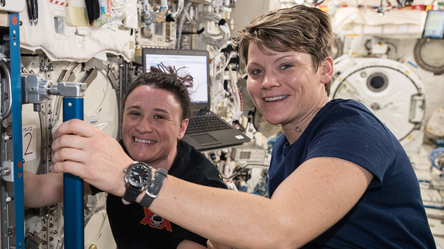 NASA astronauts Serena AuÃ±Ã³n-Chancellor (background) and Anne McClain