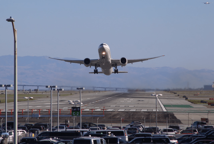 777-300 taking off from SFO Runway 28R