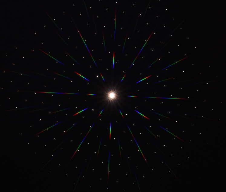 Image of a laboratory light source with a telescope equipped with a diffractive pupil as part of the TDEM-13 grant at Ames. We a