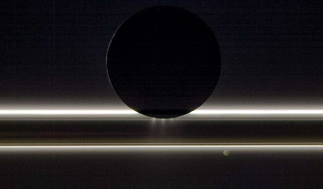 Cassini image of Enceladus and Saturn's rings