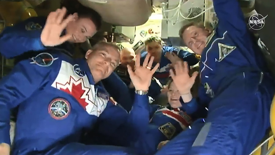 The six-member Expedition 57 crew