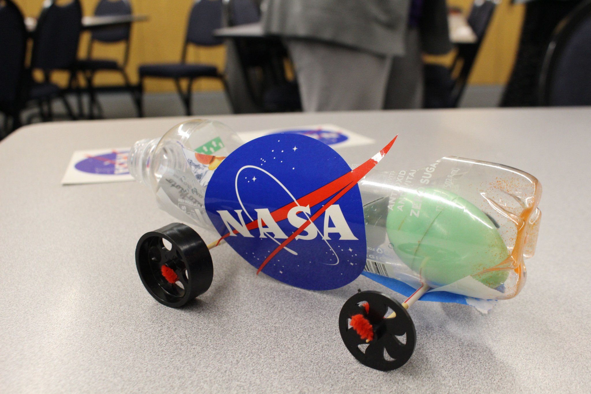A group of educators built a lunar buggy and determined the best slope of ramp for the rover to travel the farthest distance.