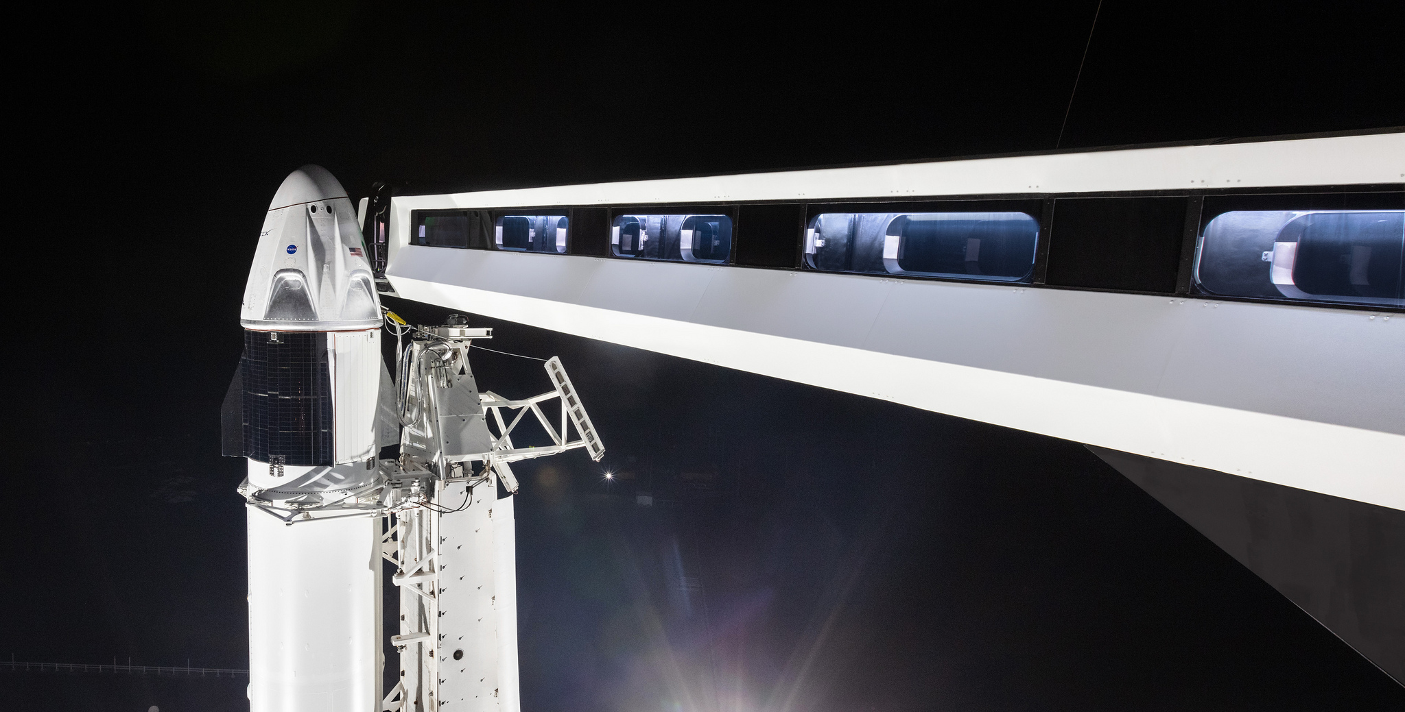 The crew access arm has been extended to the SpaceX Crew Dragon on Jan. 3, 2019, at Launch Complex 39A at Kennedy Space Center.