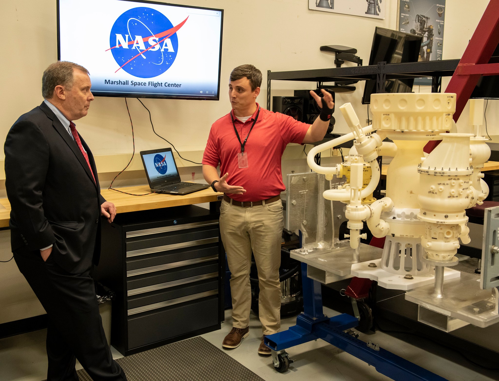 NASA Deputy Administrator Jim Morhard, left, visits the Combustion Lab at Marshall Space Flight Center on March 25.