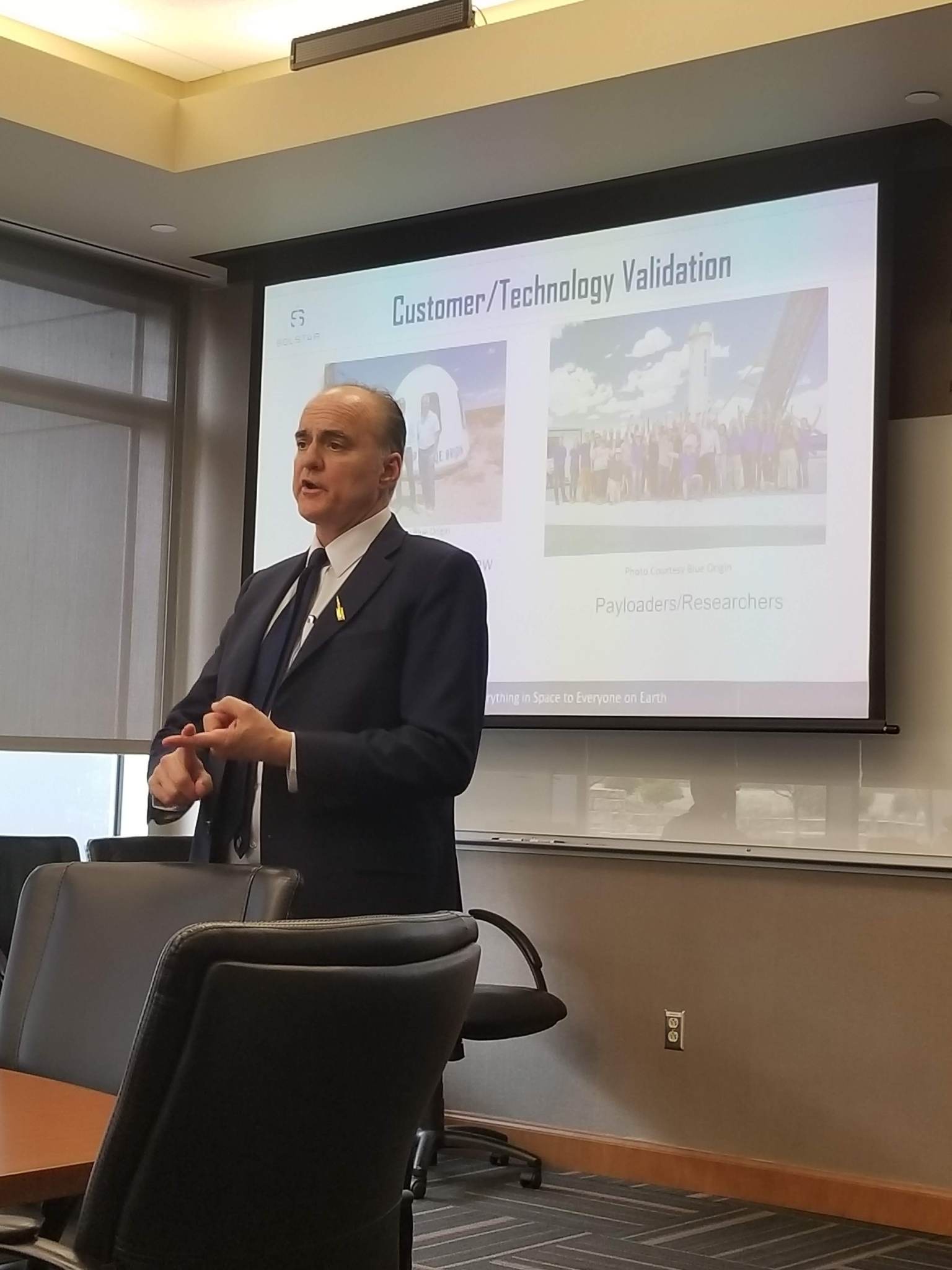 M. Brian Barnett, founder, president and CEO of SolStar Space Company, addresses team members during a Marshall Tech Talk.