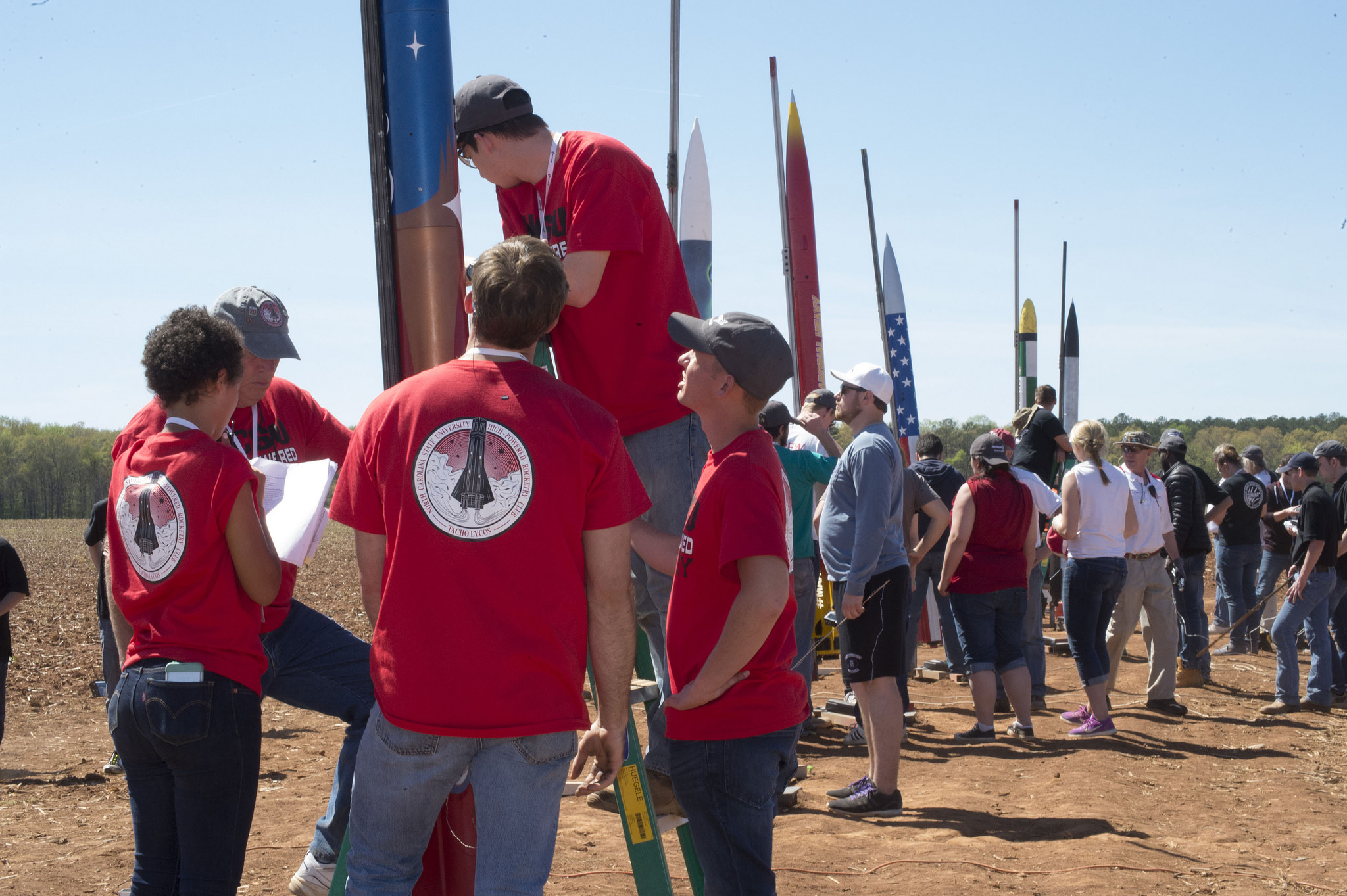 Teams prepare their rockets for launch at the 2017 Student Launch competition. 