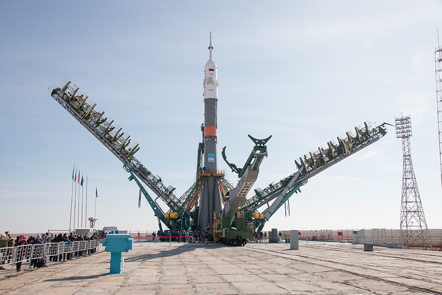 The Soyuz rocket is raised into vertical position on the launch pad at the Baikonur Cosmodrome in Kazakhstan.