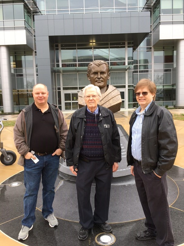 Standing in front of the sculpture bust of Dr. Wernher von Braun, are from left, Aaron Stanfield, Jack Hood and Raven Hood.