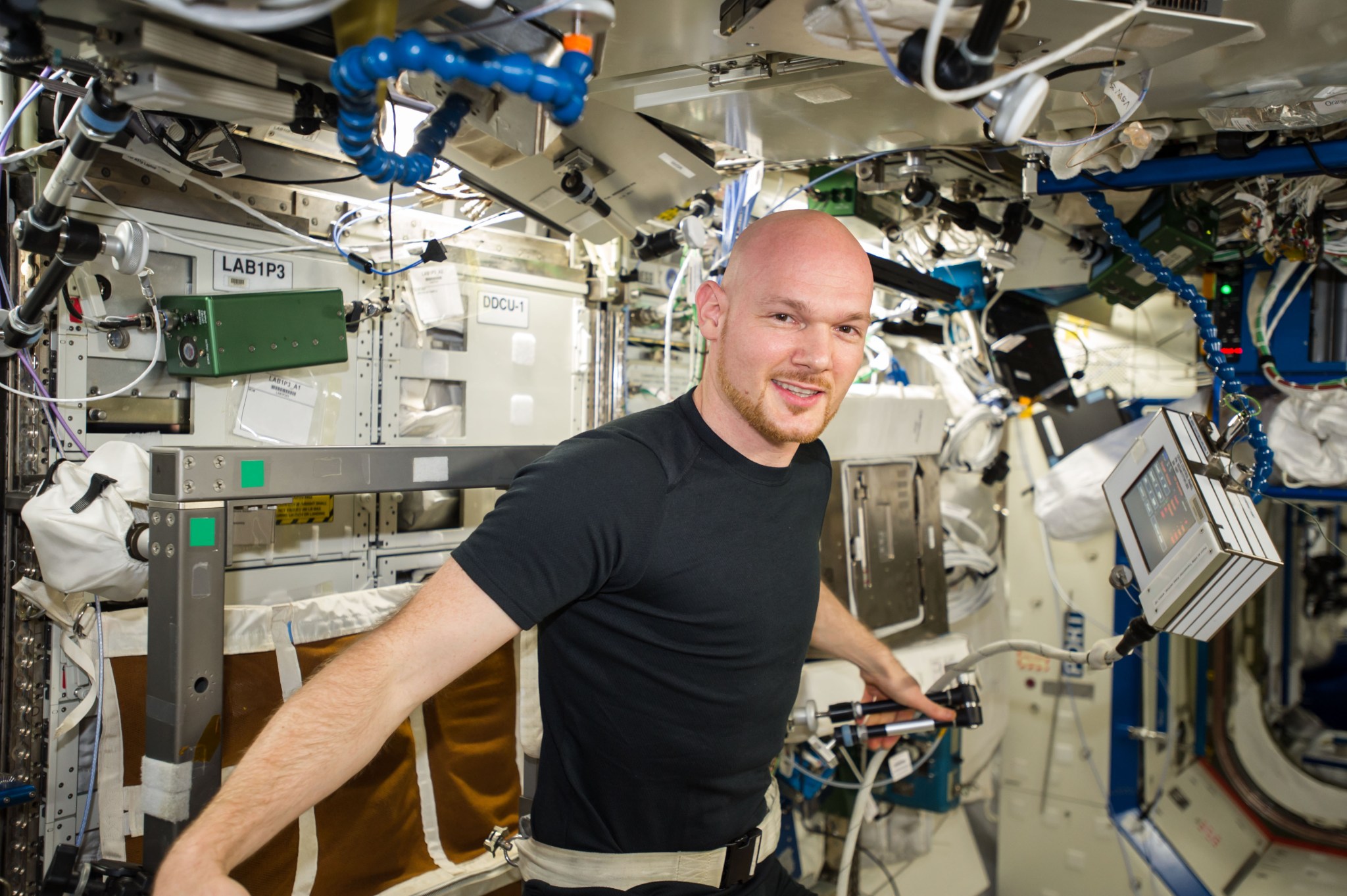 astronaut Alexander Gerst excercises on the Cycle Ergometer